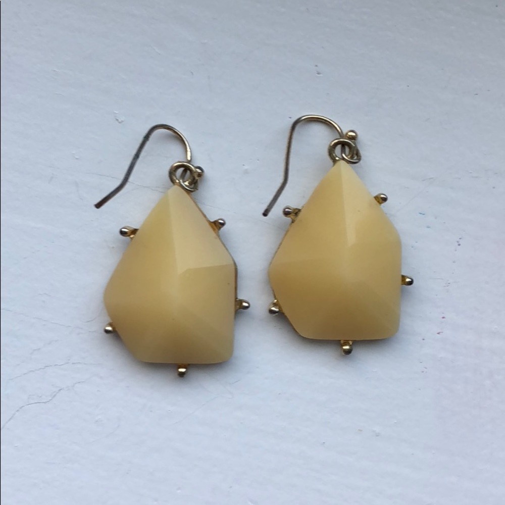 Bone and gold color earrings